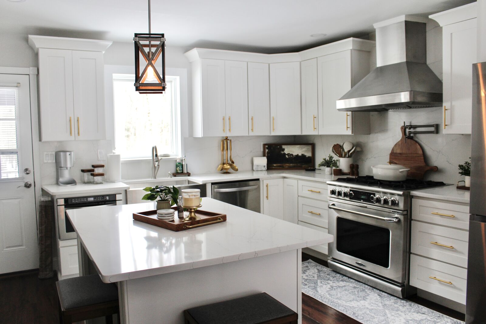 Kitchen with quartz waterfall island